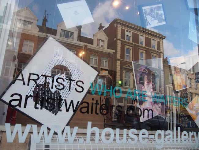 At House Gallery & Cafe, I discover a rather unusual exhibition named "Artists Who Are Waiters".