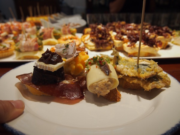 My plate is filling up: At the Pintxos Bar, you just help yourself to whatever tickles your (culinary) fancy. 
