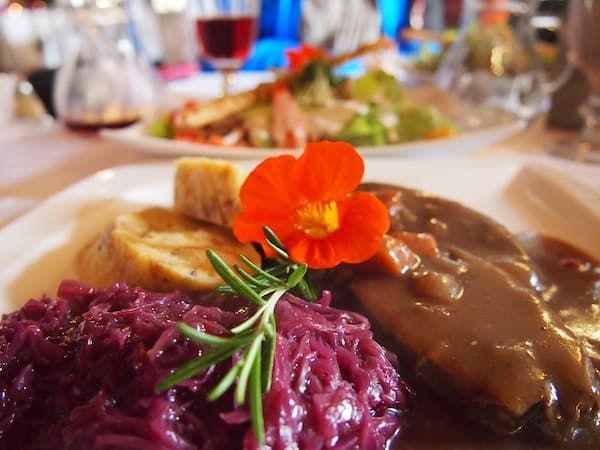After your visit, make sure you check out the local palace restaurant serving good, traditional Austrian food according to the season – such as game with red cabbage and dumplings here.