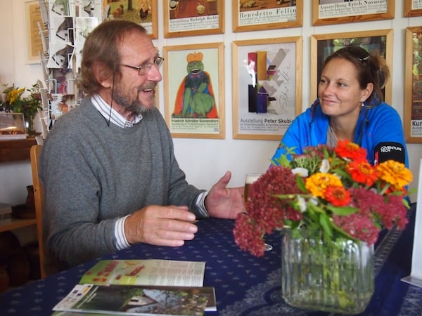 Checking for understanding: Angelika Mandler talking to Professor Kisser, who since the late 70s has started to “collect”, repair and rebuild old farmhouses from Southern Burgenland, exhibiting them here in Gerersdorf.