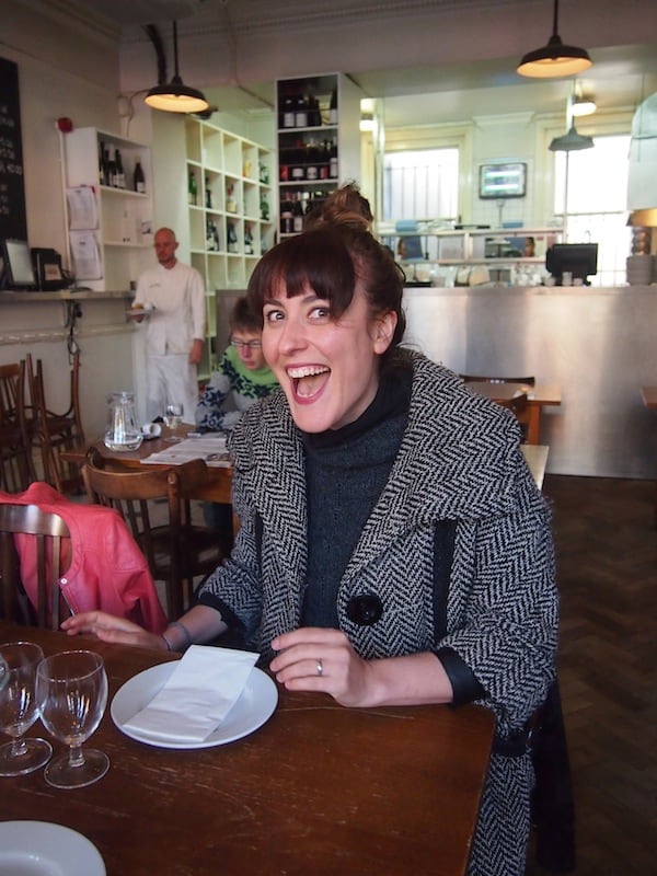 What a welcome: This is Nicole, our wonderful Eating London tour guide, with her happy smile and contagious sense of humour!