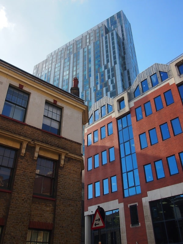 Heading round the corner, don't forget to take a look up at the stark contrast of history & modernity in this East London district of Spitalfields.