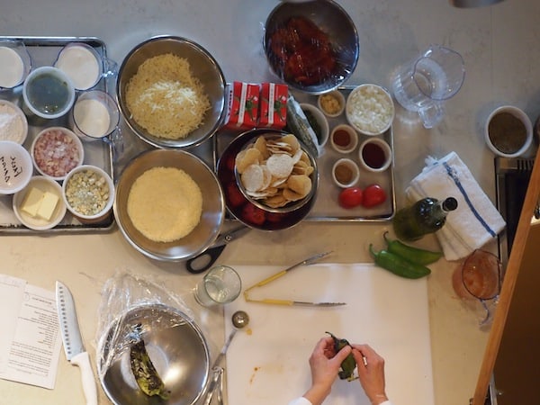 The Santa Fe School of Cooking is set up in a modern way with TV Screens & mirrors, allowing all of us to follow what is going on at the big table.