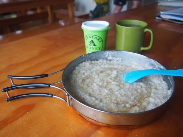 Early morning starts with breakfast: Freshly cooked porridge sweetened with lovely New Zealand Manuka Tea Tree honey!