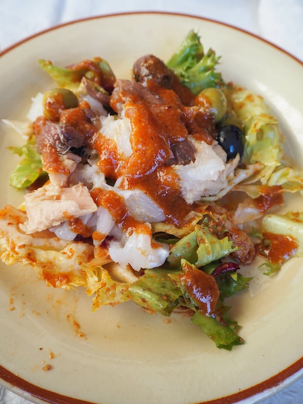 … means easily gaining a kilo or two: Xató salsa on a salad bed of a kind!
