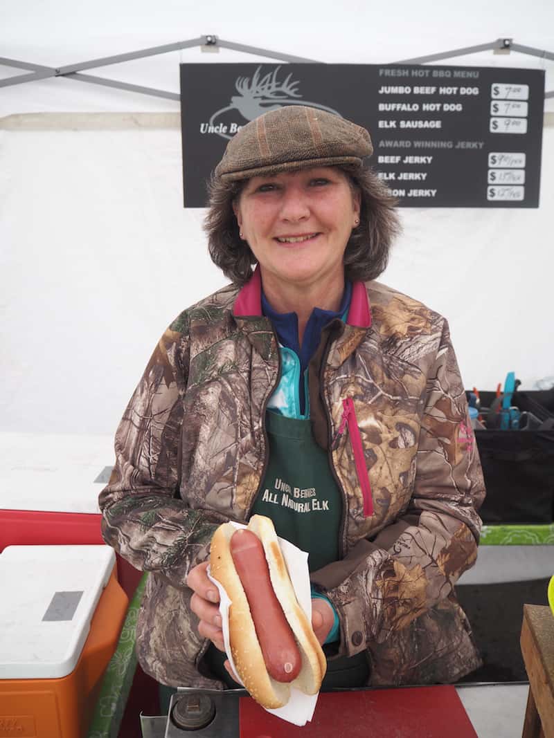 For lunch, I can recommend heading across the street (yes, it really is all that close!) to the local Farmers' Market, where this lady is offering me a "hot elk" with meat from her hand-raised, farmed elk near Calgary!