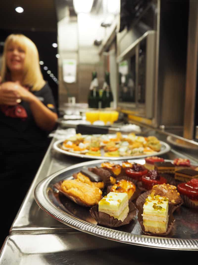 ... and have you ever wondered what you may get spoiled to on a beautiful train such as this one? Canapés, that's right. Sparkling wine. And that warm smile from Jackie I was talking about in the beginning (yep, that's her right there ..!).