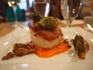 During the walking tour, we are offered this beautiful scallop with delicious veggie cream & braised artichoke hearts ...