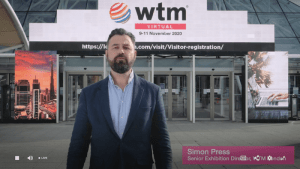 Simon Press, ..., kicks off the digital edition of London World Travel Market in front of an actual, empty ExCel London fairground. For the past decades, the entrance area has been teeming with thousands of travel business people going back and forth at this time of the year.