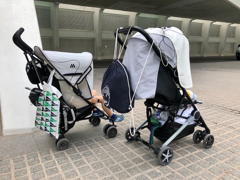 On the spot, it proved useful to borrow a second travel pram for our three-year-old. The one on the right is our own, bought especially for use as hand luggage on the plane.
