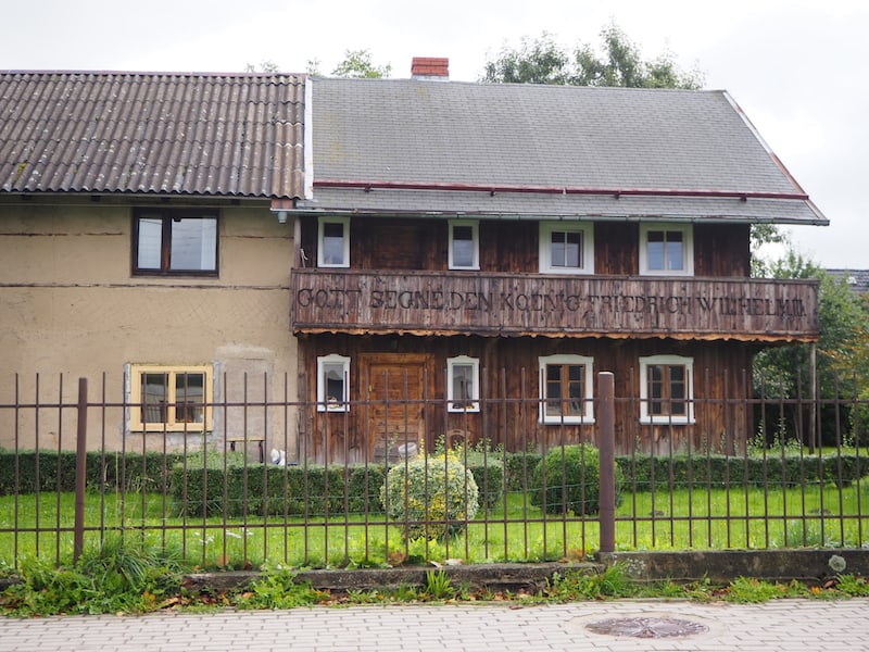 View of one of several houses built in the 19th century by religious refugees in the Tyrolean style, which have survived to this day in Myslakowice.
