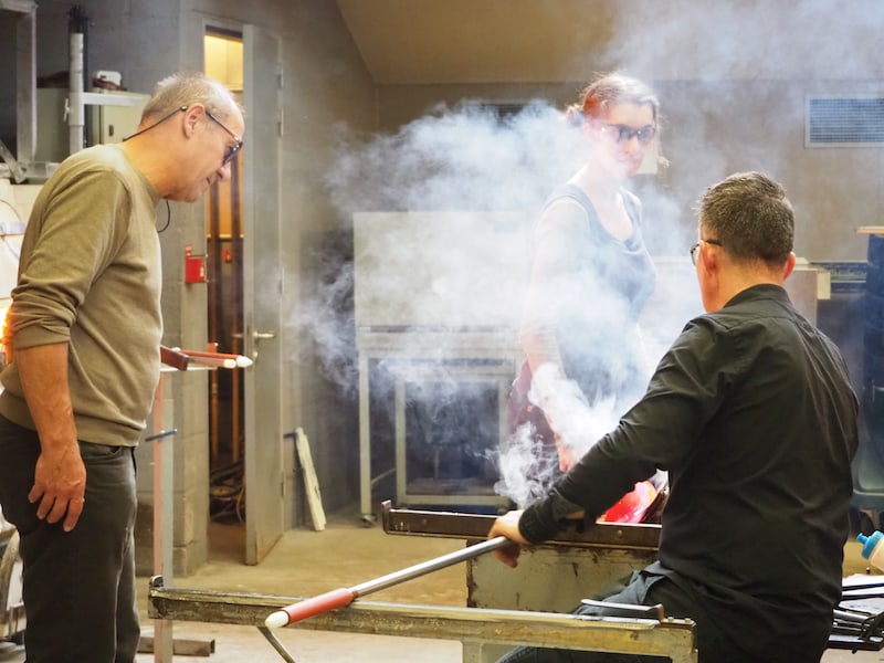 Glassblowers at work ("Glazenhuis" museum in Lommel, Flanders, Belgium)