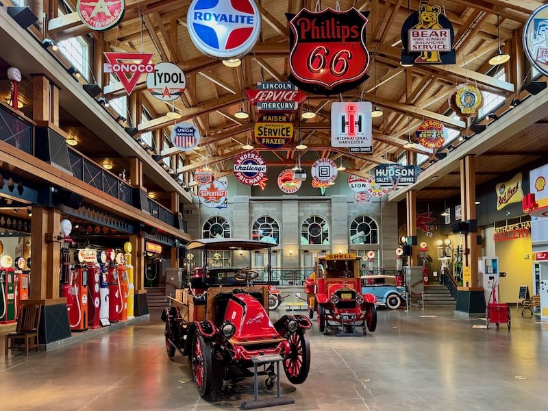The brightly coloured car museum with historic petrol stations, signs and, of course, many vintage car models in Calgary Heritage Park.